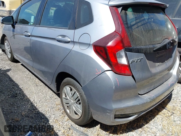 2019 Honda Fit LX z VIN 3HGGK5H42KM733455, wystawiony jako IAAI lot #42644157 z przebiegiem 51 036 mil mil oraz . Historia ofert i sprzedaży dostępna na DreamBid. Obrazek 3.
