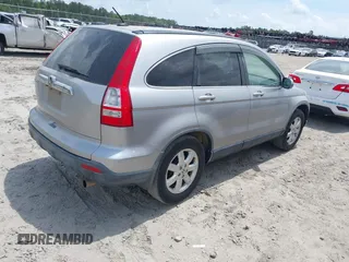 2007 Honda CR-V EX-L z VIN JHLRE38747C020517, wystawiony jako IAAI lot #42057885 z przebiegiem 217 810 mil mil oraz . Historia ofert i sprzedaży dostępna na DreamBid. Obrazek 4.