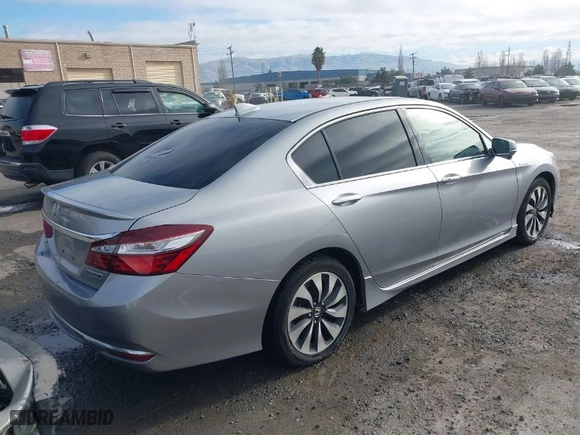 2017 Honda Accord Hybrid Touring with VIN JHMCR6F7XHC006357, listed as a IAAI auction lot 41263478 with 118,758 mi miles. Bid and sale history available at carsss.com. Image 4.