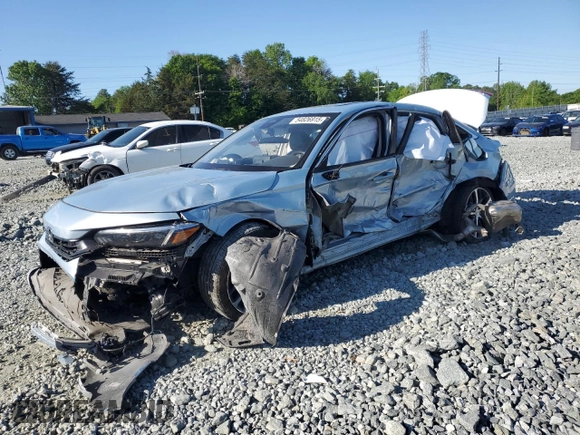 2023 Honda Civic Touring z VIN 2HGFE1F97PH305882, wystawiony jako Copart lot #54826915 z przebiegiem Nie podano mil oraz Szkoda całkowita • Salvage title. Historia ofert i sprzedaży dostępna na DreamBid. Obrazek 1.