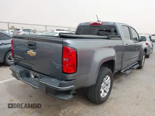 2018 Chevrolet Colorado 2WD LT z VIN 1GCGSCEN0J1223004, wystawiony jako IAAI lot #41782378 z przebiegiem 67 818 mil mil oraz . Historia ofert i sprzedaży dostępna na DreamBid. Obrazek 4.