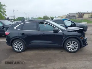 2021 Ford Escape Titanium Hybrid with VIN 1FMCU9DZ5MUA18079, listed as a IAAI auction lot 42340093 with 71,630 mi miles and . Bid and sale history available at DreamBid. Image 13.