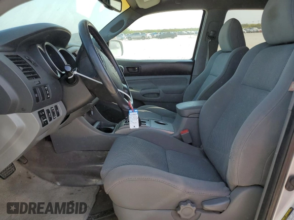 2009 Toyota Tacoma PreRunner with VIN 3TMJU62N69M079303, listed as a Copart auction lot 49885905 with 299,958 mi miles and Salvage title. Bid and sale history available at DreamBid. Image 7.
