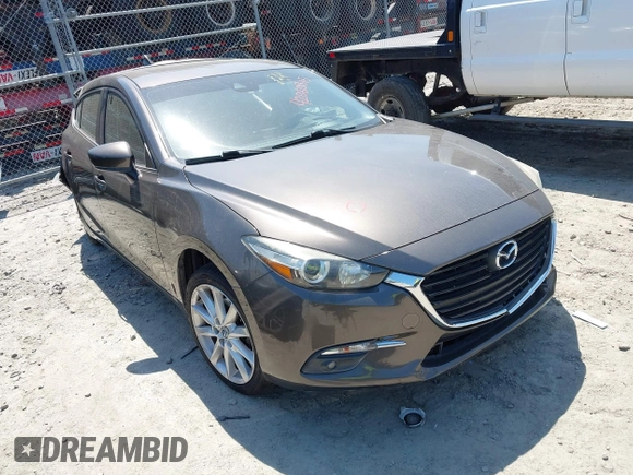2017 Mazda 3 Grand Touring z VIN 3MZBN1M39HM127811, wystawiony jako IAAI lot #42060315 z przebiegiem Nie podano mil oraz . Historia ofert i sprzedaży dostępna na DreamBid. Obrazek 1.