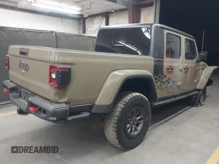 2020 Jeep Gladiator Rubicon z VIN 1C6JJTBGXLL178893, wystawiony jako IAAI lot #42206863 z przebiegiem 29 138 mil mil oraz . Historia ofert i sprzedaży dostępna na DreamBid. Obrazek 4.