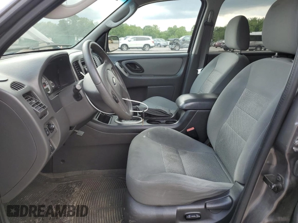 2006 Ford Escape XLT with VIN 1FMYU03136KD47701, listed as a Copart auction lot 58008695 with 176,341 mi miles and Salvage title. Bid and sale history available at DreamBid. Image 7.