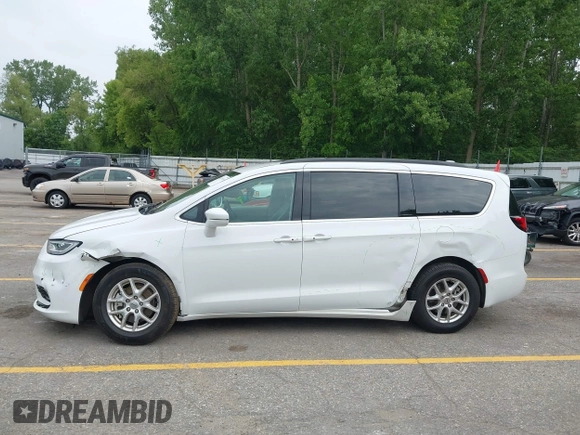 2022 Chrysler Pacifica Touring L with VIN 2C4RC1BG3NR149675, listed as a IAAI auction lot 42470593 with 59,956 mi miles and . Bid and sale history available at DreamBid. Image 14.