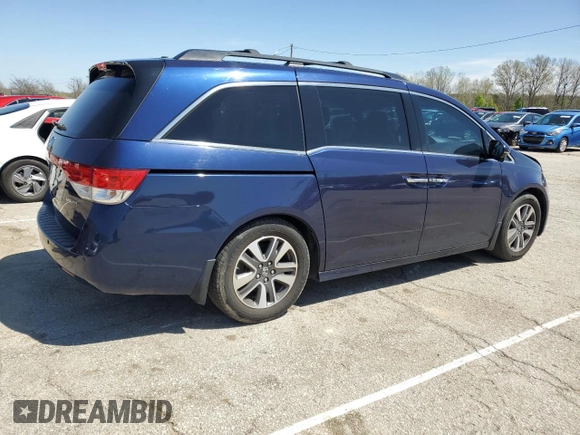 2014 Honda Odyssey Touring with VIN 5FNRL5H96EB068651, listed as a Copart auction lot 51649735 with 157,213 mi miles and Salvage title. Bid and sale history available at DreamBid. Image 3.