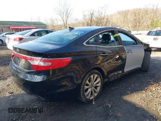 2014 Hyundai Azera with VIN KMHFG4JG7EA362185, listed as a IAAI auction lot 41877622 with 158,689 mi miles and . Bid and sale history available at DreamBid. Image 4.