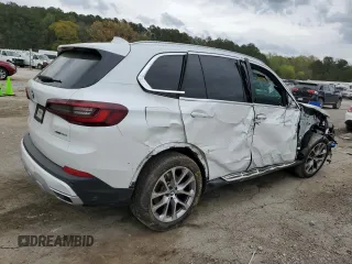 2022 BMW X5 xDrive40i with VIN 5UXCR6C01N9M26766, listed as a Copart auction lot 50990865 with 24,036 mi miles and Salvage Title. Bid and sale history available at DreamBid. Image 3.
