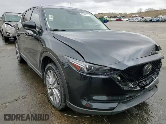 2019 Mazda CX-5 Grand Touring with VIN JM3KFBDM2K0650314, listed as a Copart auction lot 51606755 with 88,630 mi miles and Salvage Title. Bid and sale history available at carsss.com. Image 14.