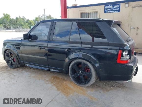 2013 Land Rover Range Rover Sport SC with VIN SALSH2E40DA799828, listed as a IAAI auction lot 42146561 with 163,740 mi miles. Bid and sale history available at carsss.com. Image 14.