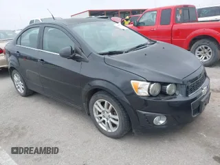 2013 Chevrolet Sonic LT with VIN 1G1JC5SHXD4251806, listed as a IAAI auction lot 42007330 with 124,838 mi miles. Bid and sale history available at carsss.com. Image 1.