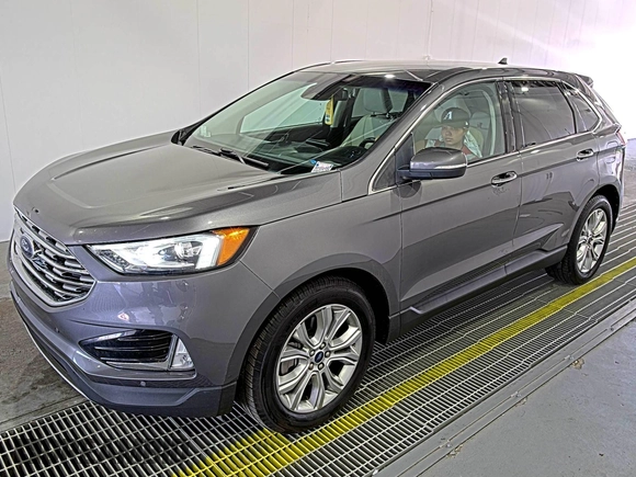 2021 Ford Edge Titanium z VIN 2FMPK3K92MBA53689, wystawiony jako IAAI lot #42501151 z przebiegiem 93 941 mil mil oraz . Historia ofert i sprzedaży dostępna na DreamBid. Obrazek 9.
