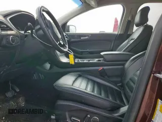 2019 Ford Edge SEL with VIN 2FMPK4J90KBB68182, listed as a Copart auction lot 57158435 with 71,598 mi miles and Salvage title. Bid and sale history available at DreamBid. Image 7.