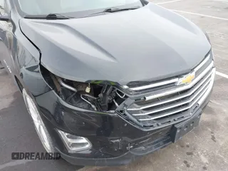 2021 Chevrolet Equinox Premier z VIN 2GNAXXEV4M6118442, wystawiony jako IAAI lot #41392148 z przebiegiem 92 170 mil mil oraz . Historia ofert i sprzedaży dostępna na DreamBid. Obrazek 6.