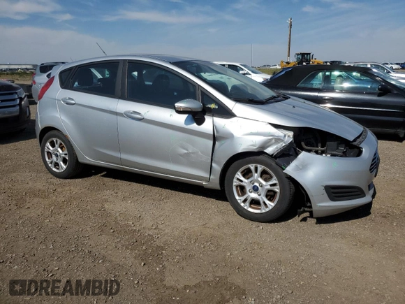 2015 Ford Fiesta SE z VIN 3FADP4EJ0FM212740, wystawiony jako Copart lot #63944573 z przebiegiem 123 037 mil mil oraz Szkoda całkowita • Salvage title. Historia ofert i sprzedaży dostępna na DreamBid. Obrazek 4.