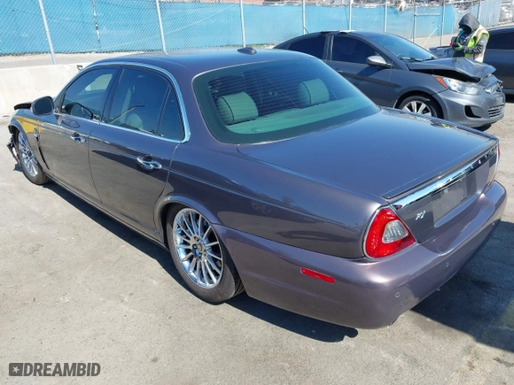 2008 Jaguar XJ with VIN SAJWA71B68SH22853, listed as a IAAI auction lot 41678688 with 76,367 mi miles. Bid and sale history available at carsss.com. Image 3.