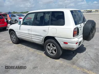 1999 Toyota RAV4 with VIN JT3GP10V5X7043735, listed as a IAAI auction lot 41939137 with 206,044 mi miles and . Bid and sale history available at DreamBid. Image 3.