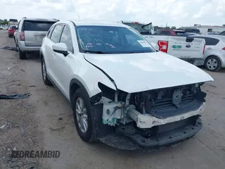 2016 Mazda CX-9 Sport z VIN JM3TCABY1G0111316, wystawiony jako IAAI lot #42085945 z przebiegiem 98 691 mil mil oraz . Historia ofert i sprzedaży dostępna na DreamBid. Obrazek 1.