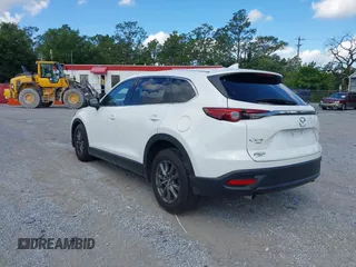 2022 Mazda CX-9 Touring z VIN JM3TCBCY7N0600787, wystawiony jako IAAI lot #42240512 z przebiegiem 27 927 mil mil oraz . Historia ofert i sprzedaży dostępna na DreamBid. Obrazek 3.