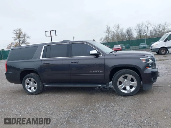 2015 Chevrolet Suburban LTZ with VIN 1GNSKKKC4FR712965, listed as a IAAI auction lot 41928053 with 188,571 mi miles. Bid and sale history available at carsss.com. Image 13.