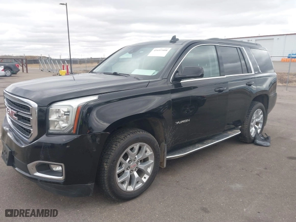2016 GMC Yukon SLT with VIN 1GKS2BKC7GR249573, listed as a IAAI auction lot 41697488 with 140,658 mi miles. Bid and sale history available at carsss.com. Image 17.