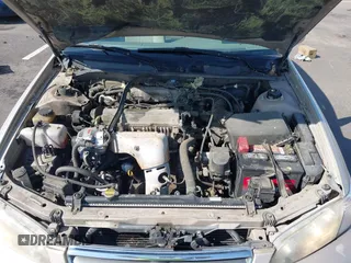 2000 Toyota Camry CE z VIN JT2BG22K2Y0440255, wystawiony jako IAAI lot #42088080 z przebiegiem 353 102 mil mil oraz . Historia ofert i sprzedaży dostępna na DreamBid. Obrazek 10.