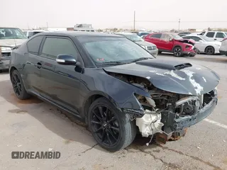 2016 Scion tC with VIN JTKJF5C76GJ017584, listed as a IAAI auction lot 41938981 with 121,166 mi miles. Bid and sale history available at carsss.com. Image 1.
