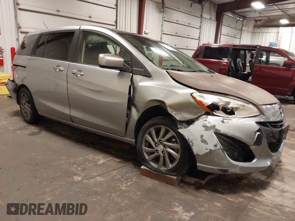 2012 Mazda 5 Sport z VIN JM1CW2BL1C0115371, wystawiony jako IAAI lot #42134834 z przebiegiem 138 840 mil mil oraz . Historia ofert i sprzedaży dostępna na DreamBid. Obrazek 1.