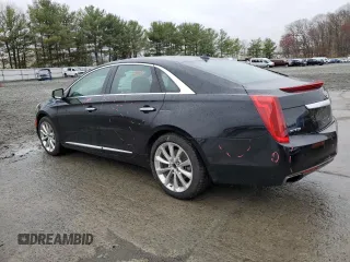 2014 Cadillac XTS Luxury with VIN 2G61M5S35E9138744, listed as a Copart auction lot 51545615 with 61,661 mi miles and Salvage Title. Bid and sale history available at carsss.com. Image 2.