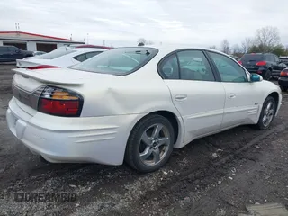 2004 Pontiac Bonneville SLE z VIN 1G2HY52K54U215710, wystawiony jako IAAI lot #41497635 z przebiegiem 123 343 mil mil oraz . Historia ofert i sprzedaży dostępna na DreamBid. Obrazek 4.