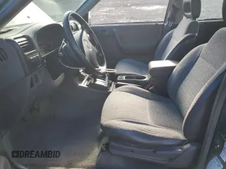 1999 Isuzu Rodeo S with VIN 4S2CM58W7X4359649, listed as a Copart auction lot 83450174 with 171,940 mi miles and Salvage title. Bid and sale history available at DreamBid. Image 7.