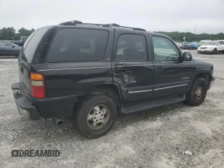 2001 Chevrolet Tahoe LS z VIN 1GNEC13T51J268893, wystawiony jako Copart lot #58527885 z przebiegiem 285 422 mil mil oraz Szkoda całkowita • Salvage title. Historia ofert i sprzedaży dostępna na DreamBid. Obrazek 3.