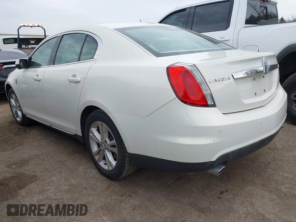 2012 Lincoln MKS with VIN 1LNHL9DR1CG803625, listed as a IAAI auction lot 41733683 with 199,590 mi miles. Bid and sale history available at carsss.com. Image 3.