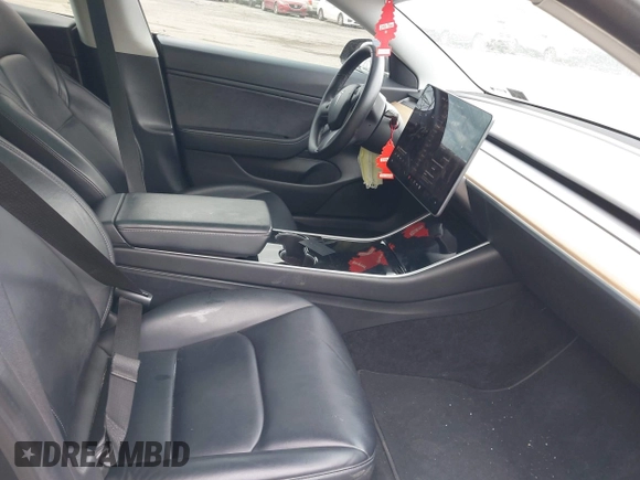 2020 Tesla Model 3 Long Range with VIN 5YJ3E1EB2LF646449, listed as a IAAI auction lot 42059086 with 120,981 mi miles and . Bid and sale history available at DreamBid. Image 5.