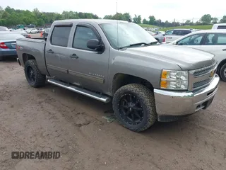 2013 Chevrolet Silverado 1500 LT with VIN 3GCPKSE78DG246175, listed as a IAAI auction lot 42106648 with 161,940 mi miles. Bid and sale history available at carsss.com. Image 1.