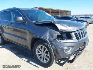 2014 Jeep Grand Cherokee Laredo with VIN 1C4RJEAG4EC317072, listed as a IAAI auction lot 41476862 with 127,742 mi miles. Bid and sale history available at carsss.com. Image 6.