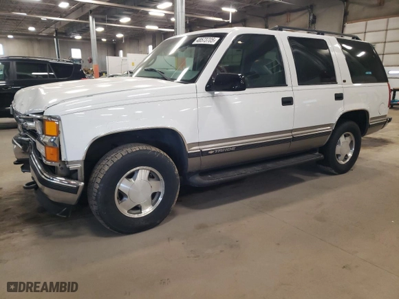 1999 Chevrolet Tahoe Z71 with VIN 1GNEK13R8XJ476282, listed as a Copart auction lot 48573705 with 207,260 mi miles and Salvage Title. Bid and sale history available at carsss.com. Image 1.