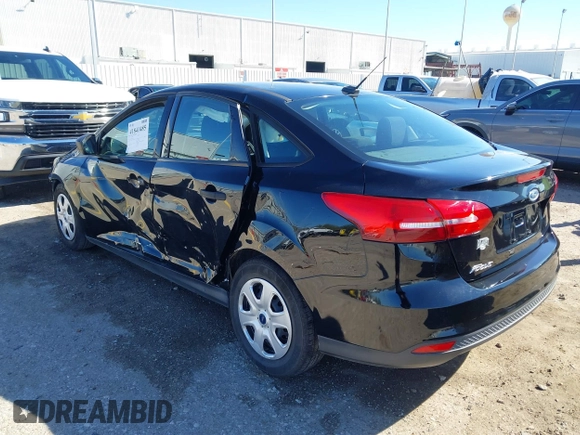 2018 Ford Focus S with VIN 1FADP3E29JL259004, listed as a IAAI auction lot 41841485 with 77,567 mi miles. Bid and sale history available at carsss.com. Image 3.