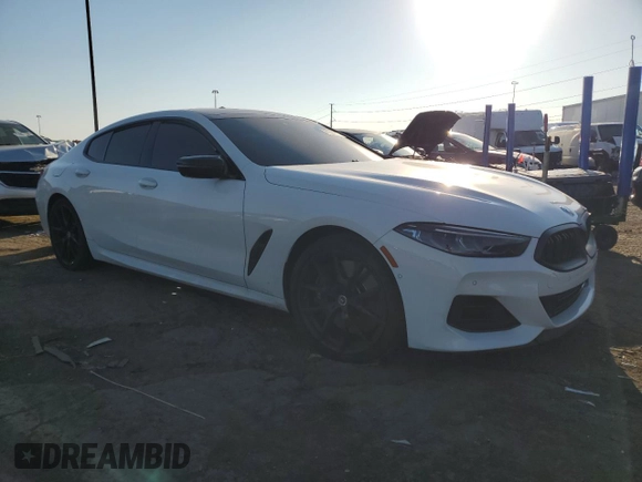 2023 BMW 8 Series M850i z VIN WBAGV8C01PCL31007, wystawiony jako Copart lot #76536874 z przebiegiem Nie podano mil oraz Czysty tytuł • Clean title. Historia ofert i sprzedaży dostępna na DreamBid. Obrazek 4.