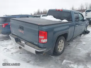 2014 GMC Sierra 1500 SLE with VIN 1GTV2UEH1EZ166326, listed as a IAAI auction lot 41555559 with 75,717 mi miles. Bid and sale history available at carsss.com. Image 4.
