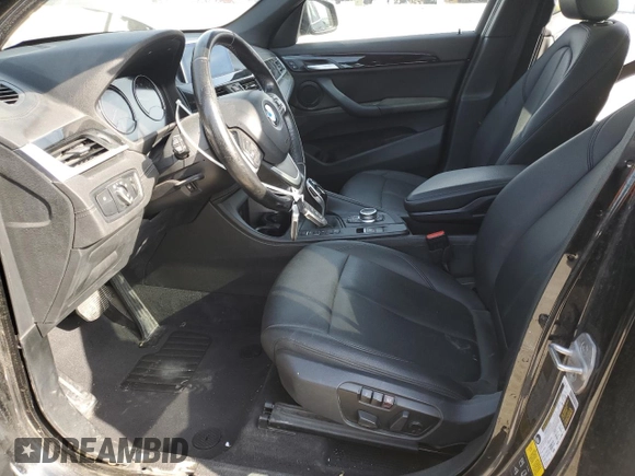 2020 BMW X1 xDrive28i with VIN WBXJG9C06L5P89796, listed as a Copart auction lot 52817235 with 95,665 mi miles and Salvage title. Bid and sale history available at DreamBid. Image 7.