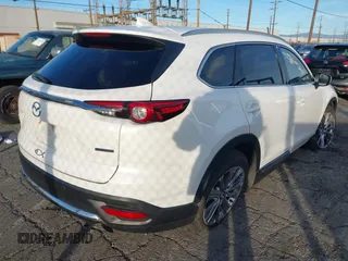 2021 Mazda CX-9 Signature with VIN JM3TCBEY6M0536883, listed as a IAAI auction lot 41388130 with 65,613 mi miles. Bid and sale history available at carsss.com. Image 4.