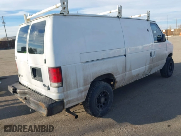 2001 Ford Econoline Cargo Commercial with VIN 1FTNE24L21HA95140, listed as a IAAI auction lot 41490323 with 330,136 mi miles and . Bid and sale history available at carsss.com. Image 4.