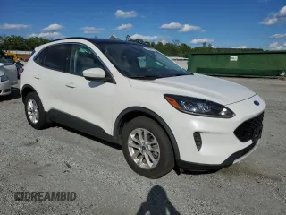 2020 Ford Escape SE with VIN 1FMCU9G62LUA20274, listed as a Copart auction lot 55508005 with 63,067 mi miles and Salvage title. Bid and sale history available at DreamBid. Image 4.