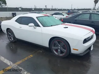 2013 Dodge Challenger SXT with VIN 2C3CDYAG7DH736726, listed as a IAAI auction lot 41530042 with 129,259 mi miles. Bid and sale history available at carsss.com. Image 1.