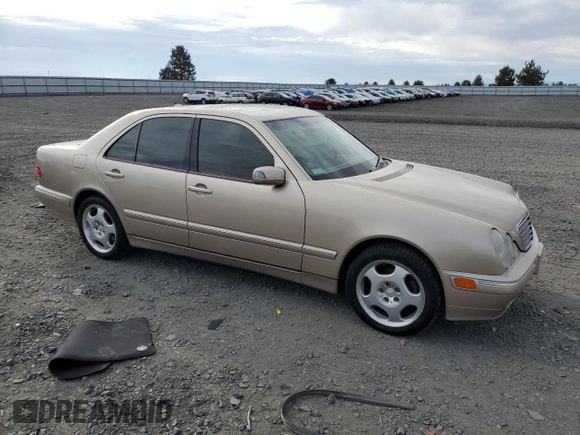 2001 Mercedes-Benz E-Class with VIN WDBJF70JX1B220786, listed as a Copart auction lot 71808344 with 94,476 mi miles and Salvage Title. Bid and sale history available at carsss.com. Image 4.