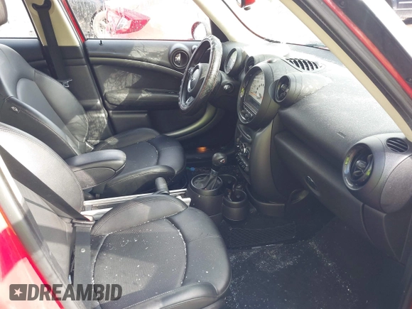 2014 MINI Countryman S with VIN WMWZC3C52EWP29433, listed as a IAAI auction lot 42179585 with 179,871 mi miles and . Bid and sale history available at DreamBid. Image 5.