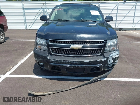 2011 Chevrolet Suburban LT with VIN 1GNSKJE34BR151246, listed as a IAAI auction lot 42520210 with 239,240 mi miles and . Bid and sale history available at DreamBid. Image 6.
